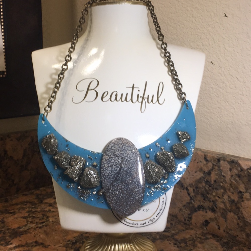 Pyrite and Onyx necklace with dinosaur egg.